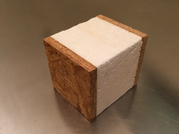 Small Structural Insulated Panel sample showing its facings and core
